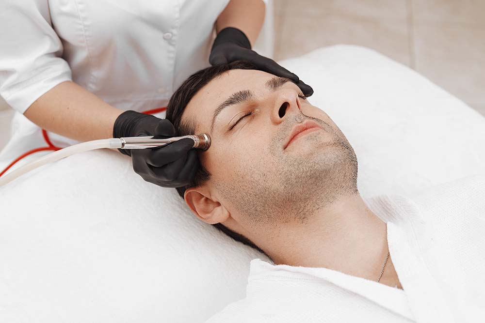 Photo of a Microdermabrasion treatment for a man